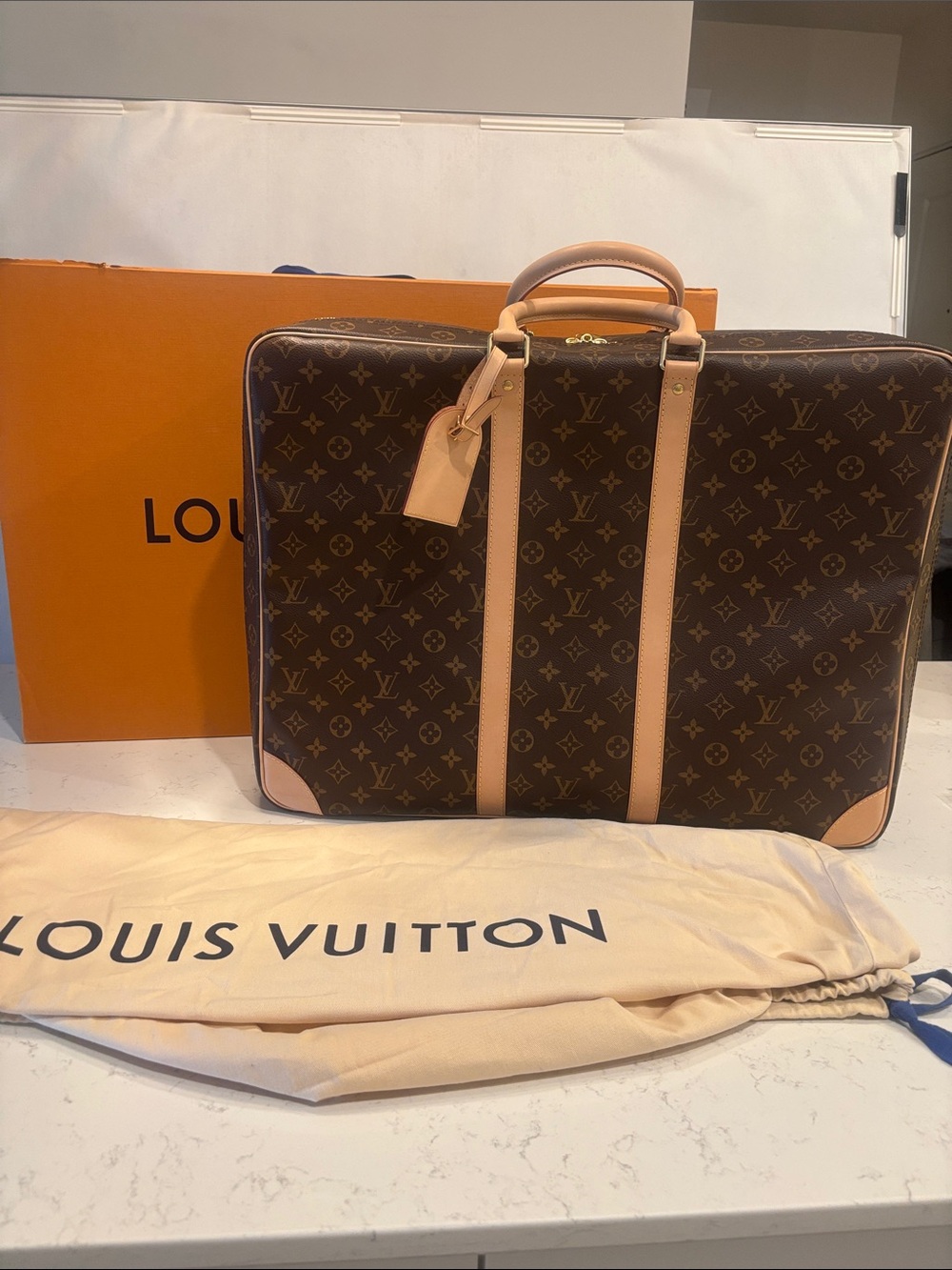 Louis Vuitton Monogram Sirius 55